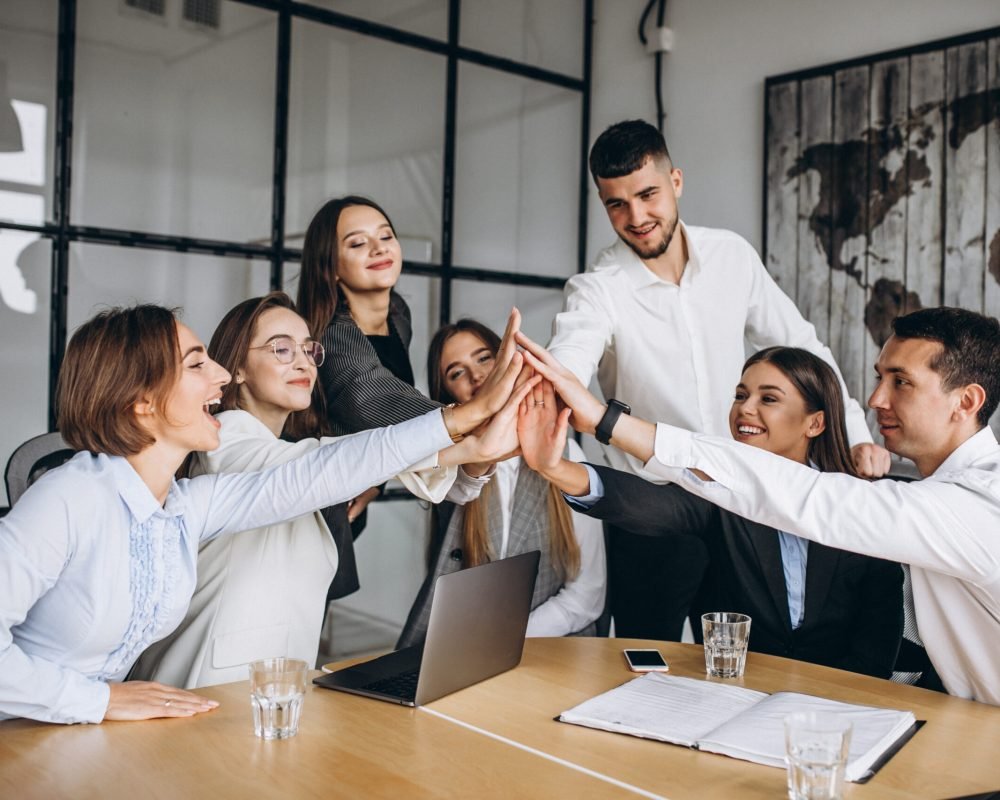 Group of people working out business plan in an office